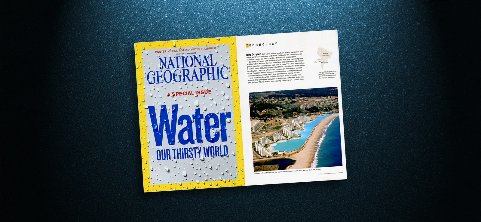 Doble página de National Geographic (abril 2010) con la piscina de San Alfonso del Mar; la foto lleva crédito de Reuters.